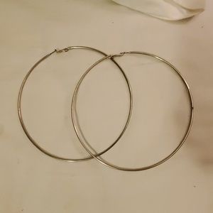 Ridiculously big hoop earrings